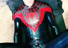 young man gets fucked in a rubber spidey suit