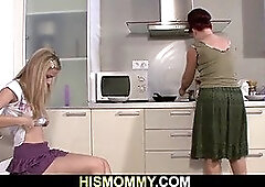 His redhead mom licks young pussy on the kitchen