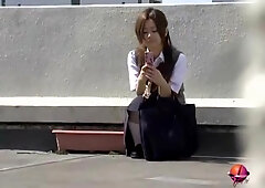 Asian babe texting on a sunny day boob sharked and licked.