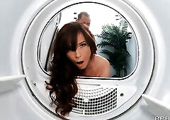 As Syren De Mer loads the washing machine, this babe's surprised to discover her sex toy, which appears to be to have undergone a spin cycle of i
