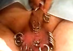 Nasty guy got his cock tortured with piercings BDSM porn