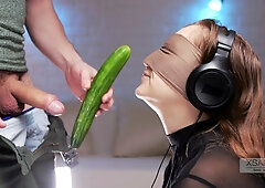 American friend tricks blindfolded brunette into taste test with cucumber and cock
