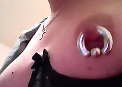 shows her puffy nipples with her butt