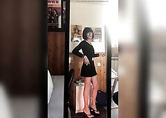 Sissy Andreina looks in the mirror and walks on high heels