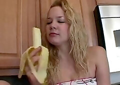 Naughty solo teen slut chewing on a banana