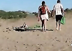 Carol and Alberto go to the beach, but they aren't going to swim ;)