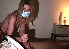 HJ masked masseuse gets groping while jerking client cock