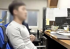 Coopid in front of his desk