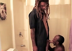 Black guy gives a blowjob to a kinky dude with dreadlocks
