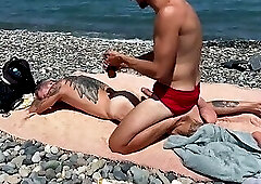Horny guys have sex on the beach - cums multiple times in a twink's hole