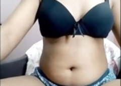 Stunning desi bhabhi Tanvi in a flashy bathing suit showing off her curves