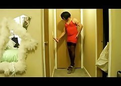 Amateur crossdresser with dildo on a bed