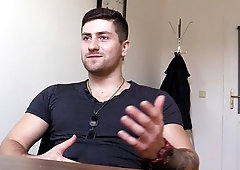 Inked-up newcomer fucked during a porn casting sesh