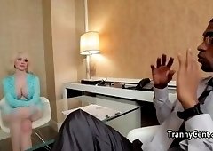 Tattooed black guy fucks busty tgirl