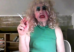 Cumslut fag trannie Sarah Millward, smokes, in cum stained mini mini-skirt indignity