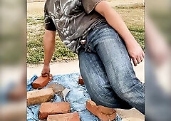 Taking a sneaky despairing public void urine outside with schlong thru jeans fly close to neighbors