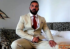 Muscular dude gets a cumshot while enjoying a kinky fetish session