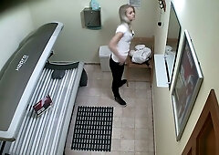 Blonde Czech girl caught on hidden cam stripping in a public solarium