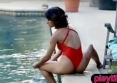 Curvy Latina babe strips swimsuit by the pool to expose big tits