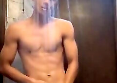 Asian Boy Handsome, Beautiful body After Exercising in the Shower Gym