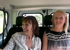 Mature women welcome a shy bespectacled man into their car for tender closeness