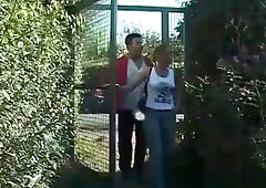 Outdoor BDSM action where guy and girl