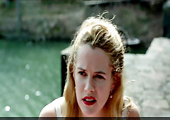 Blonde celebrity Riley Keough gets naughty in public with a topless bra-clad scene