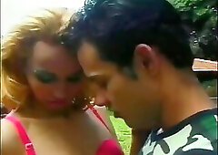 Pretty young shemale Claudia Hunter in red lingerie was banged on the cutting in a forest