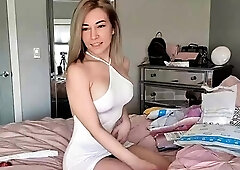 Masturbating busty blonde teen on couch with big toys