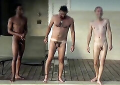 Four men at swimming pool