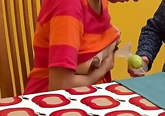 Old woman teaching youthful woman to pump breast milk