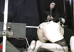 Dominant-bitch Nika has enjoyment with her thrall's butt, this babe put him on a banging machine