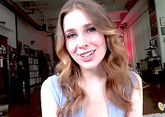 Fiona Sprouts teases with a playful wink before taking him between her breasts
