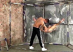 Submissive twink suspended in the air to take a pounding