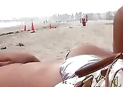 hottie shemale posing on the beach