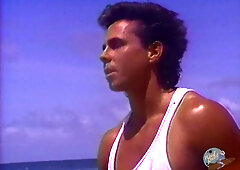 Stephanie Rage takes Peter North deep on the beach in vintage outdoor heat