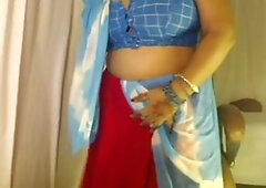 After kissing her stunning breasts, she pleasures herself with her big nipples.