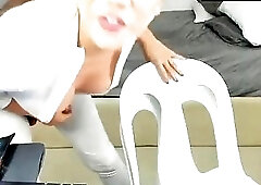 Amazing shemale in white with big cock piss in her mout