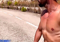 Risky public bareness at daylight on a freeway