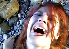 Fiery redhead girlfriend takes him deep during rough bareback sex on the rocks