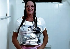 Mature shemale uses a monster dildo on her tight ass