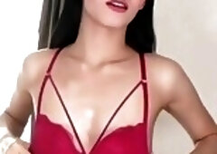 Striking brunette shemale in red lingerie jerks off and cums