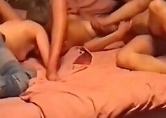 Hot wife surprises her husband by bringing home a sexy lady for a naughty night of fun! This amateur video shows a daring wife exploring her wild side