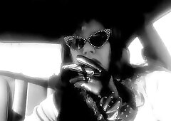 Mature Redhead Wearing LeatherGloves -Holder Smoking VS120 in Car
