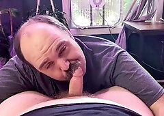 Horny mustache daddy Don Keydick gives a sloppy blowjob to burly bear Rusty Piper's thick man-meat, deepthroats, and strokes until he explodes wi