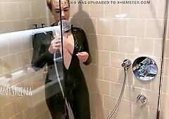 IWantSheena stripping down latex below the shower.