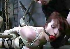 Redhead lady gets tied up and toyed by master BDSM