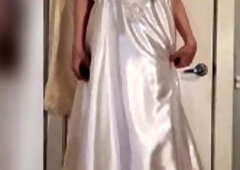 Trying on my vintage satin wedding costume with a skirt and glossy hose.