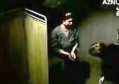 M Brochard given medical exam in advance of processing in a 1974 movie scene