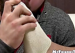 Tattooed hunk receives feet licking while masturbating